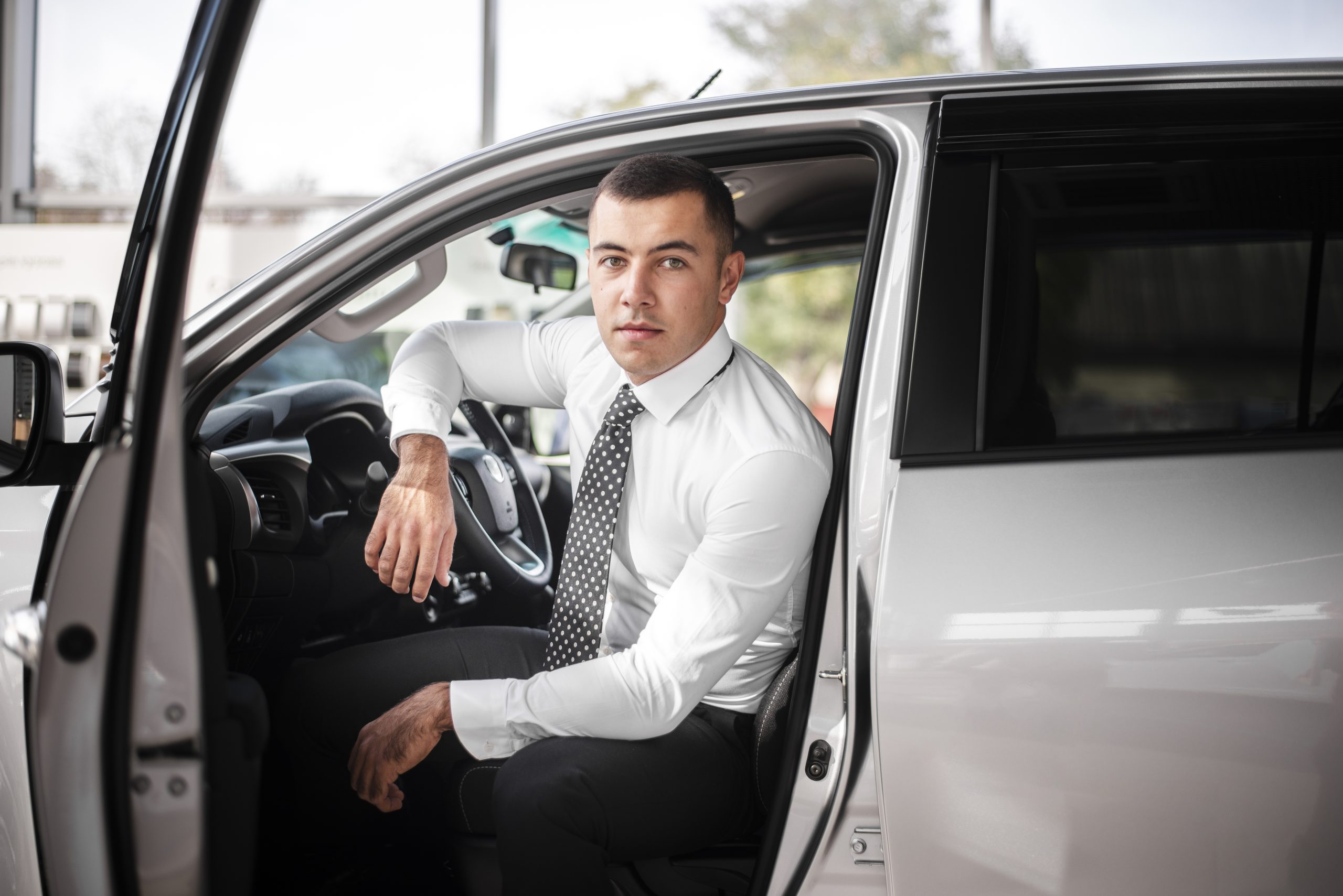 senior businessman hands driving car